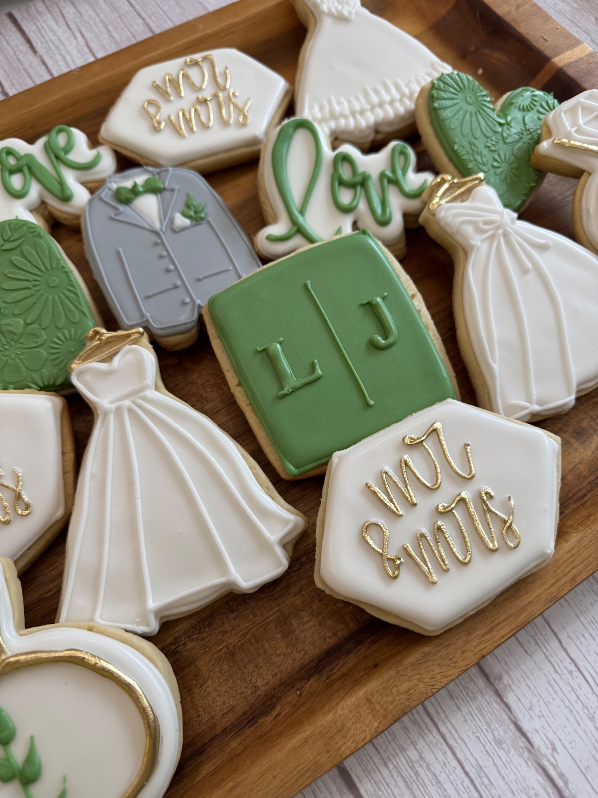 Custom decorated cookies by Kicker Konfections