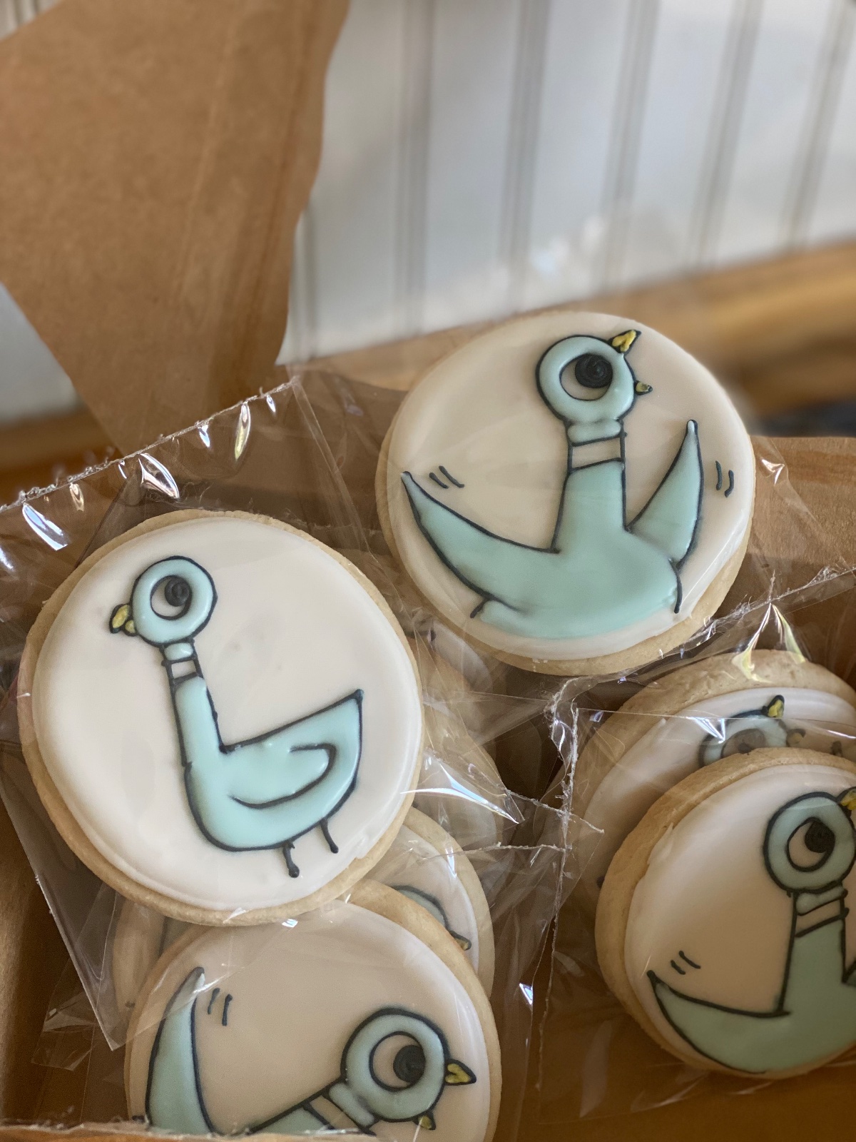 Custom decorated cookies by Kicker Konfections