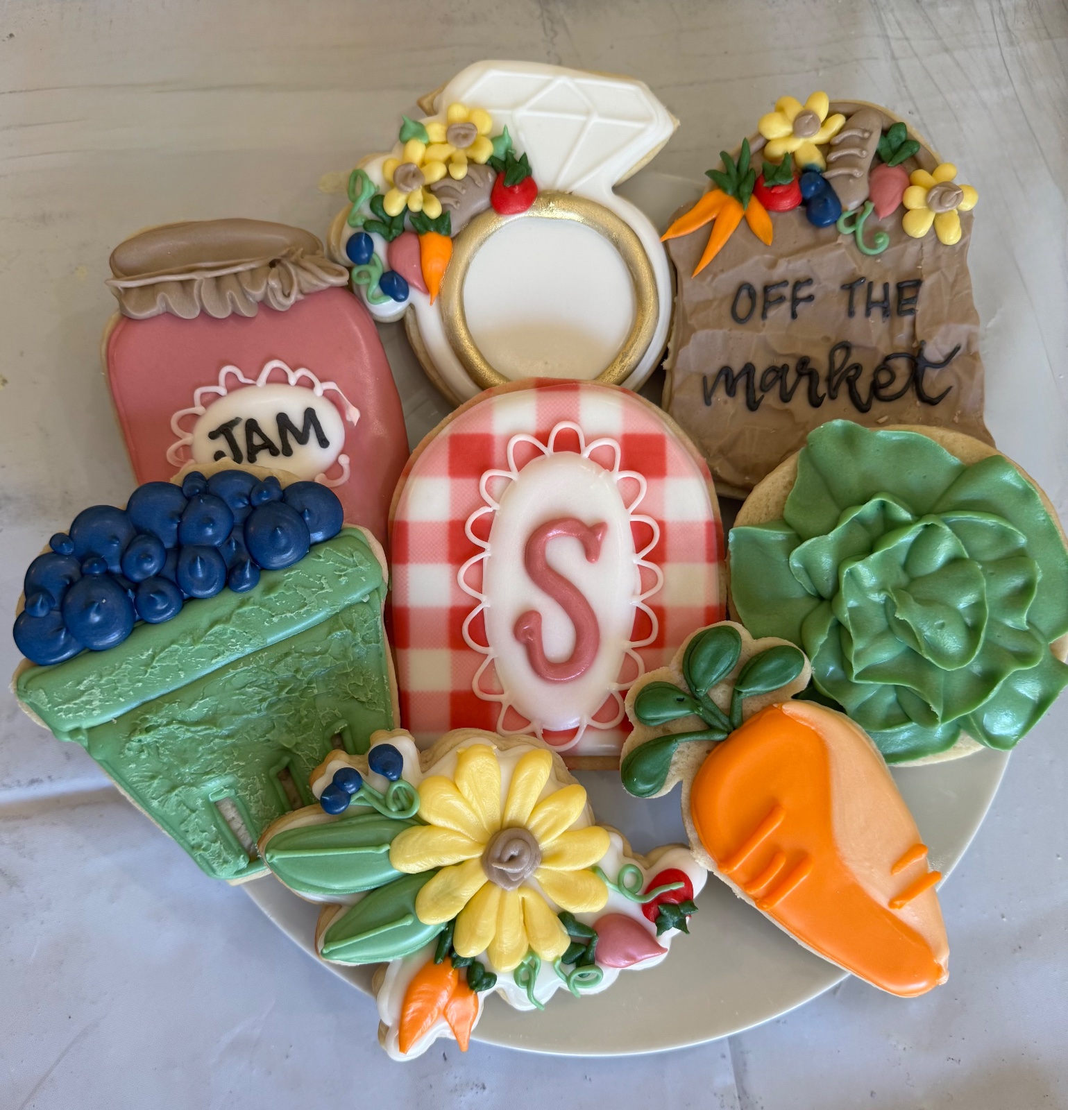 Custom decorated cookies by Kicker Konfections