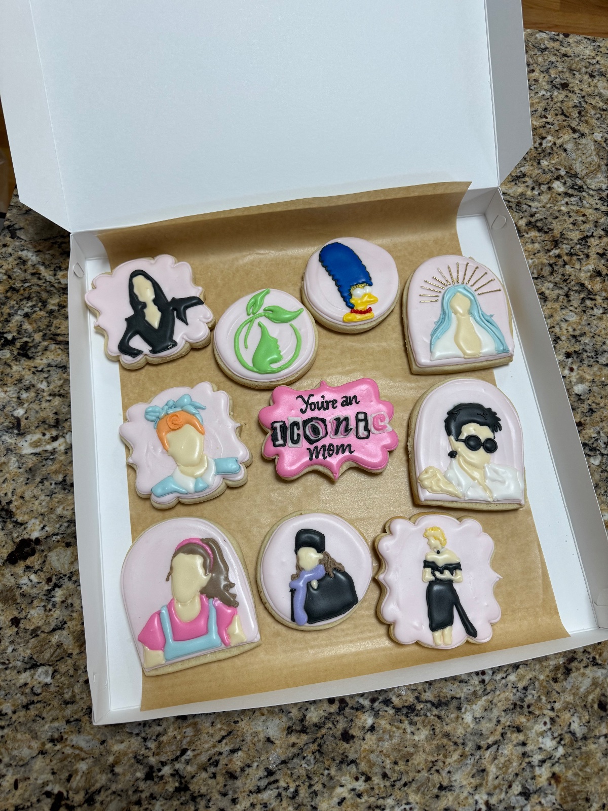 Custom decorated cookies by Kicker Konfections