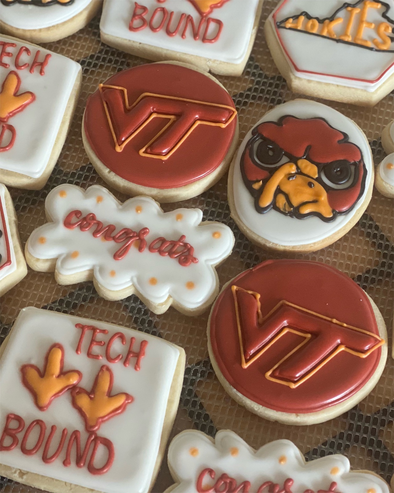Custom decorated cookies by Kicker Konfections