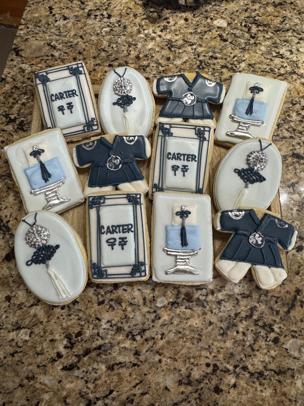 Custom decorated cookies by Kicker Konfections