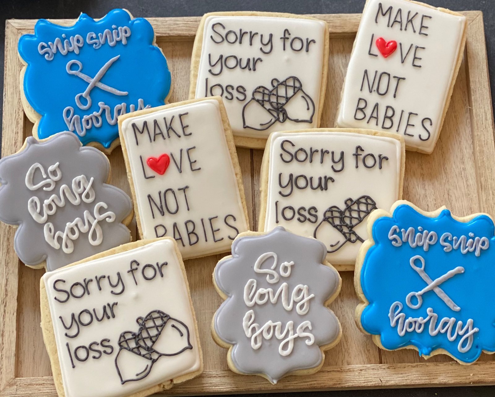 Custom decorated cookies by Kicker Konfections