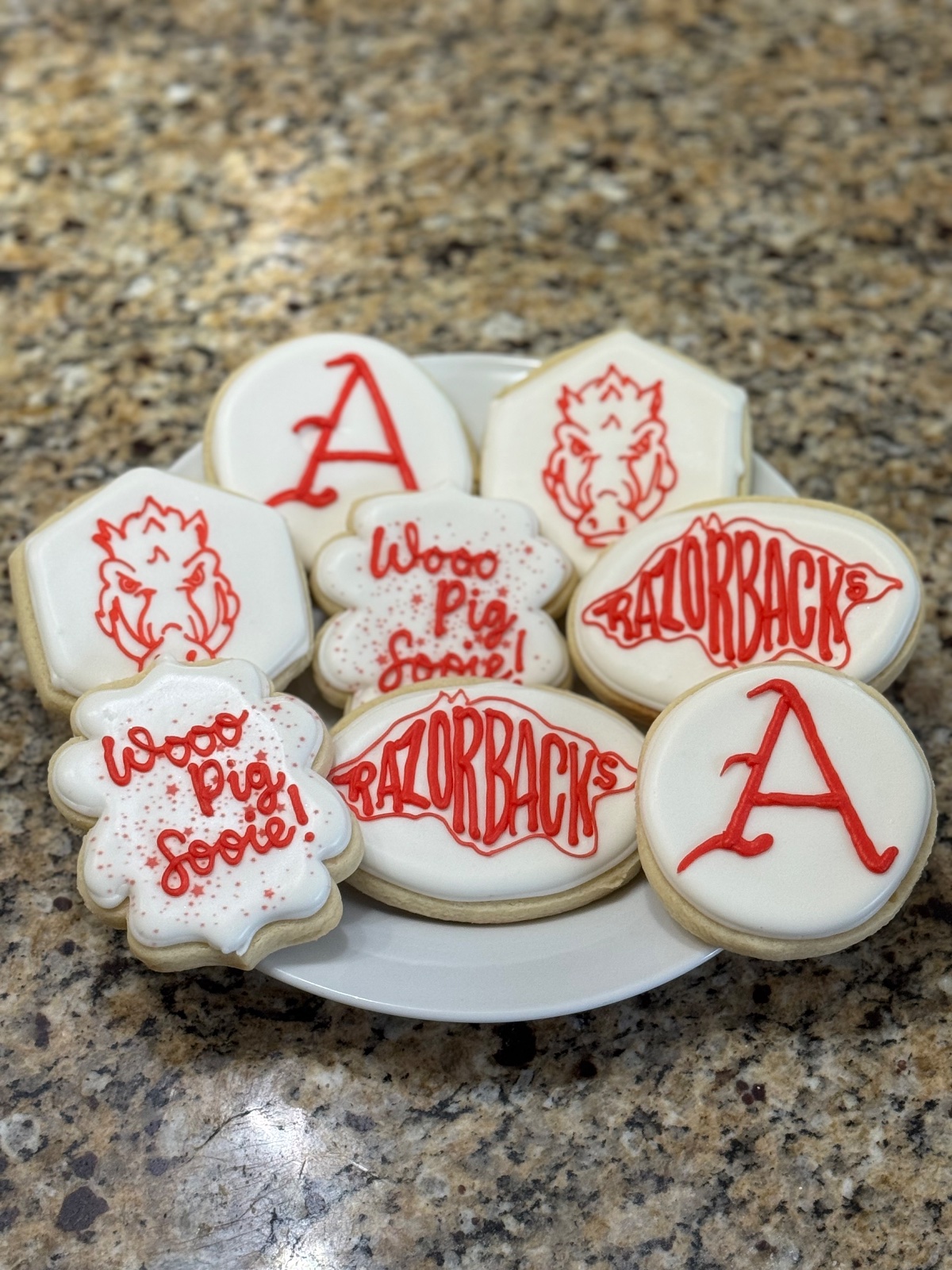 Custom decorated cookies by Kicker Konfections