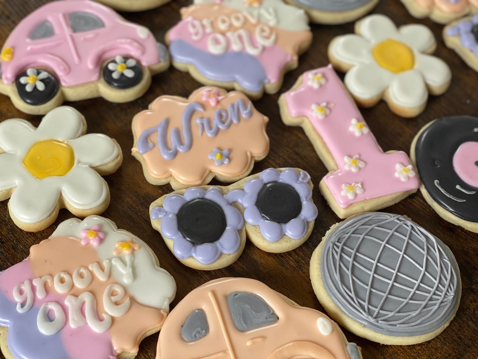 Custom decorated cookies by Kicker Konfections