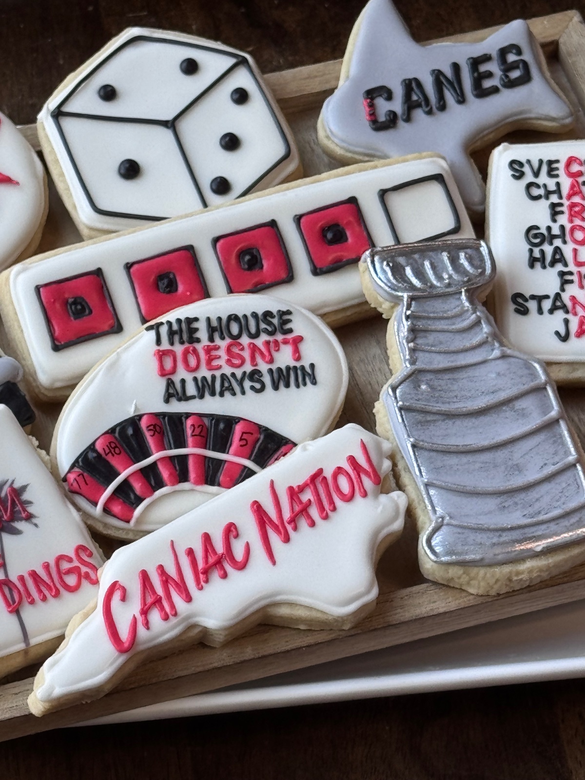 Custom decorated cookies by Kicker Konfections