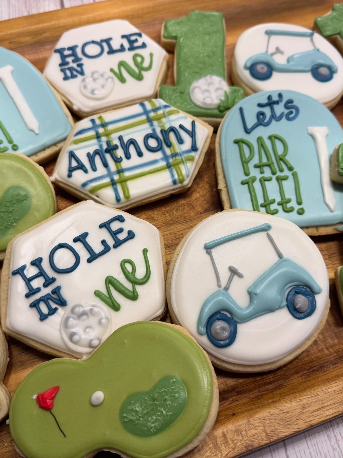 Custom decorated cookies by Kicker Konfections
