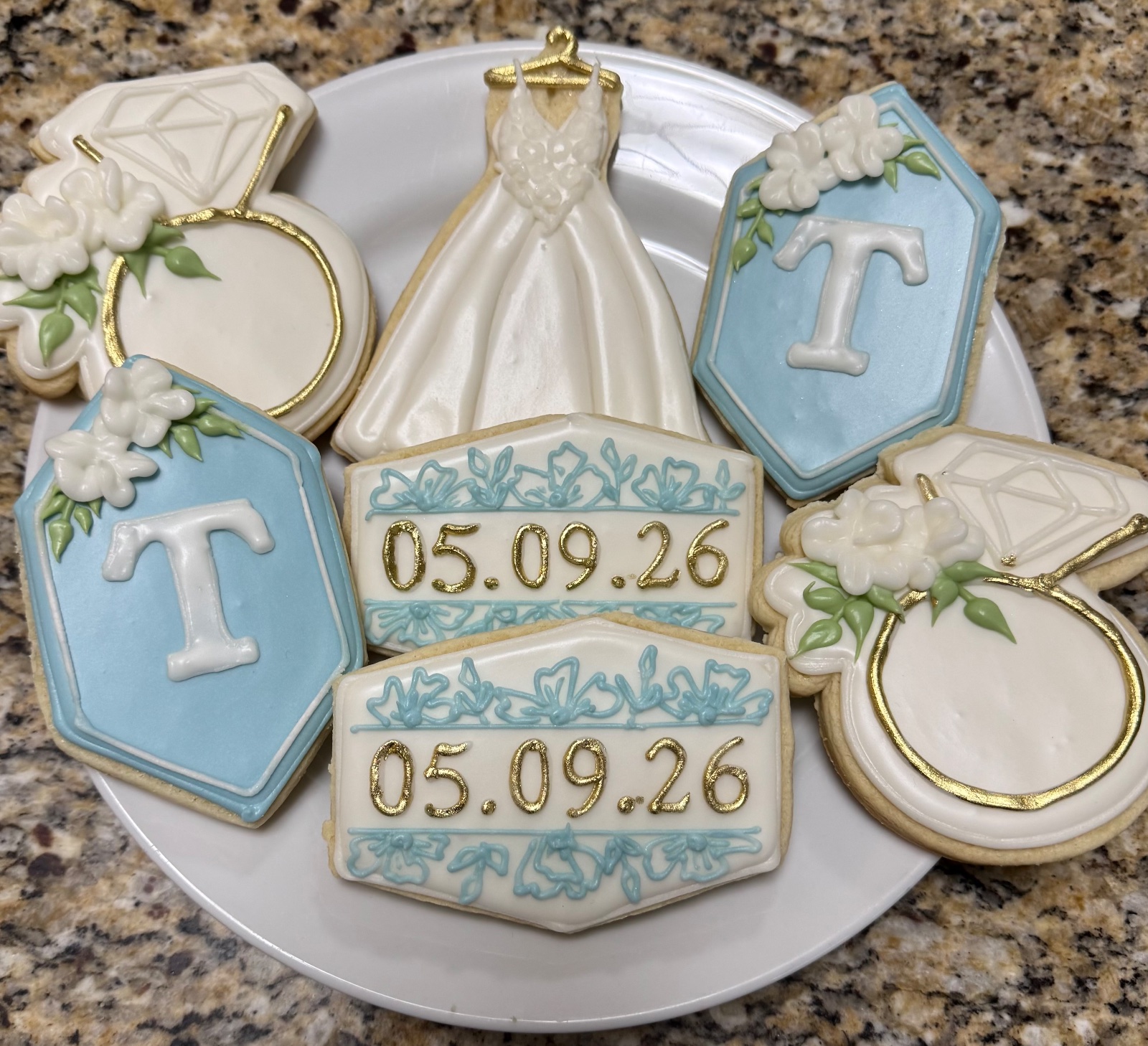 Custom decorated cookies by Kicker Konfections