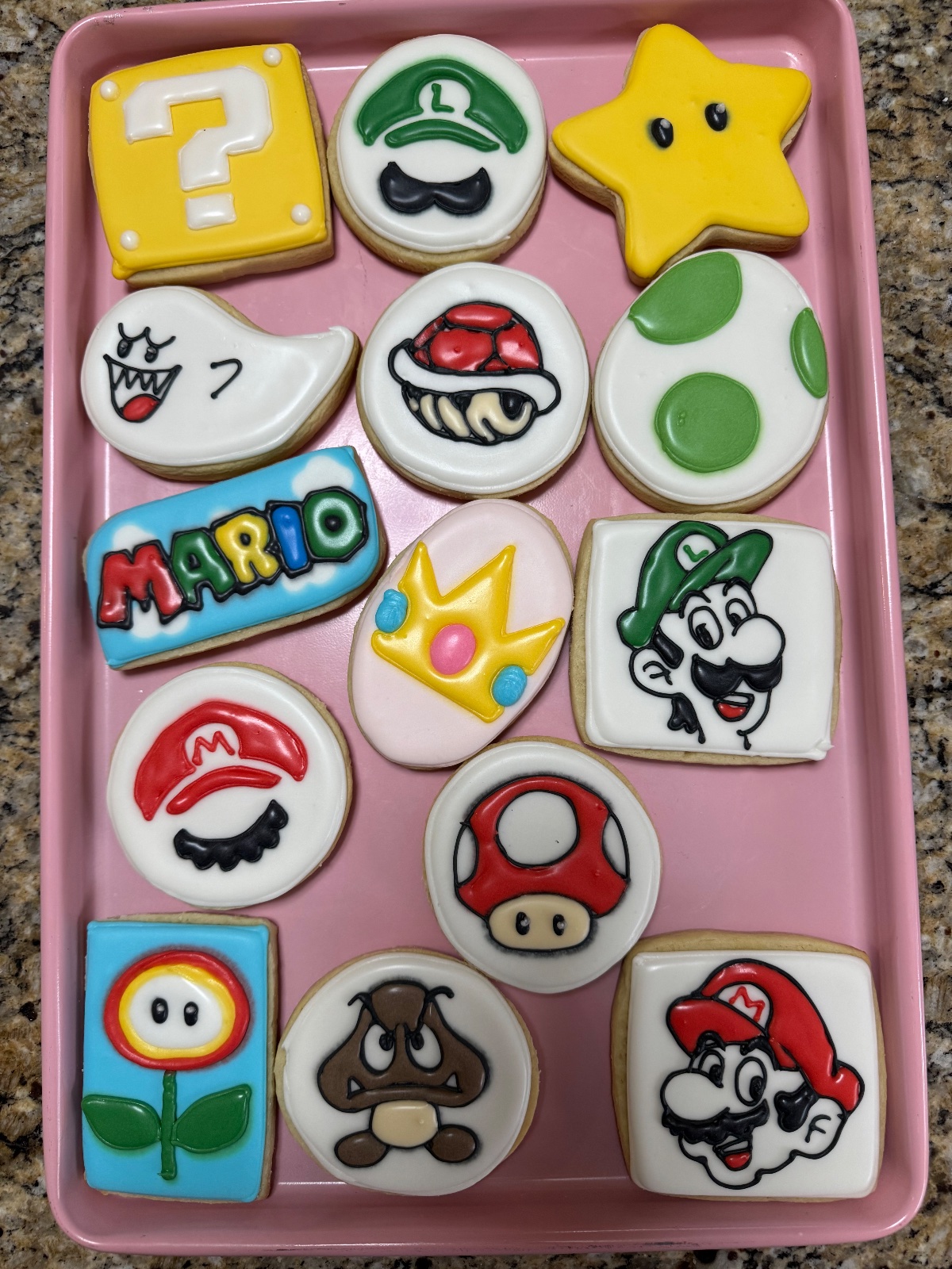 Custom decorated cookies by Kicker Konfections