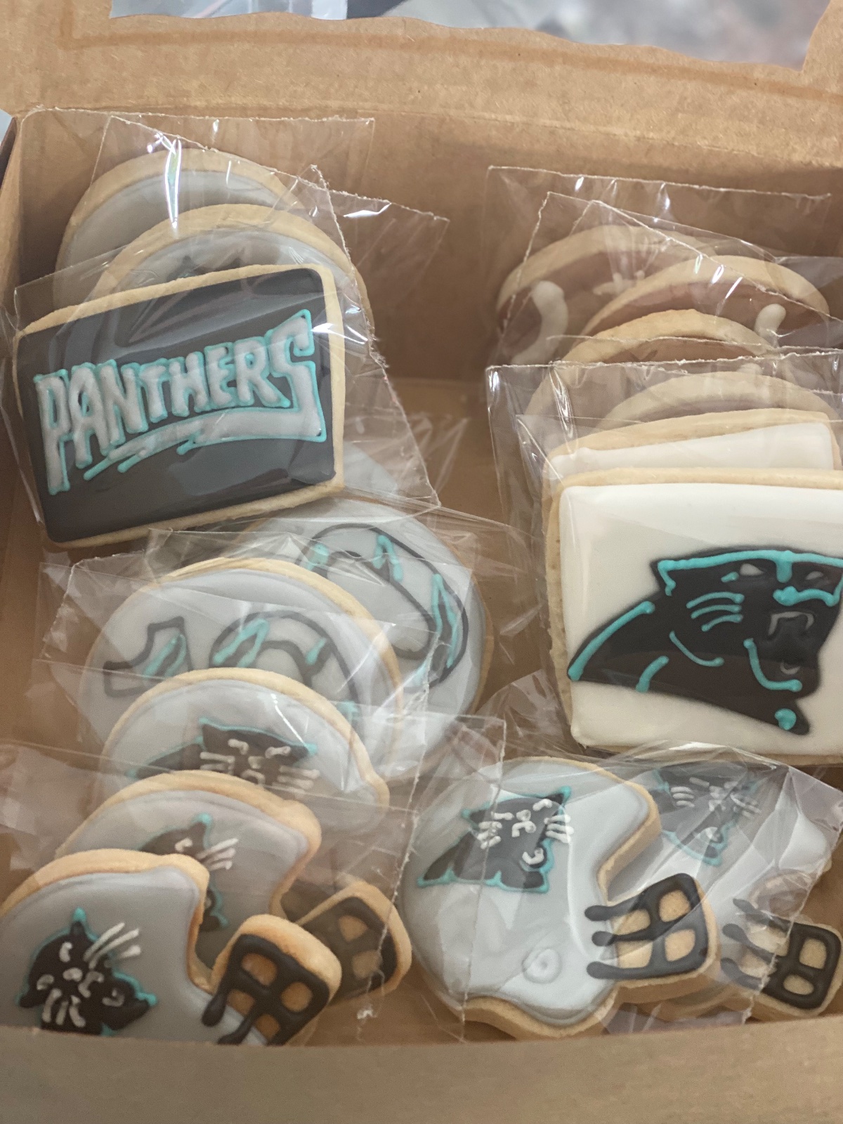 Custom decorated cookies by Kicker Konfections