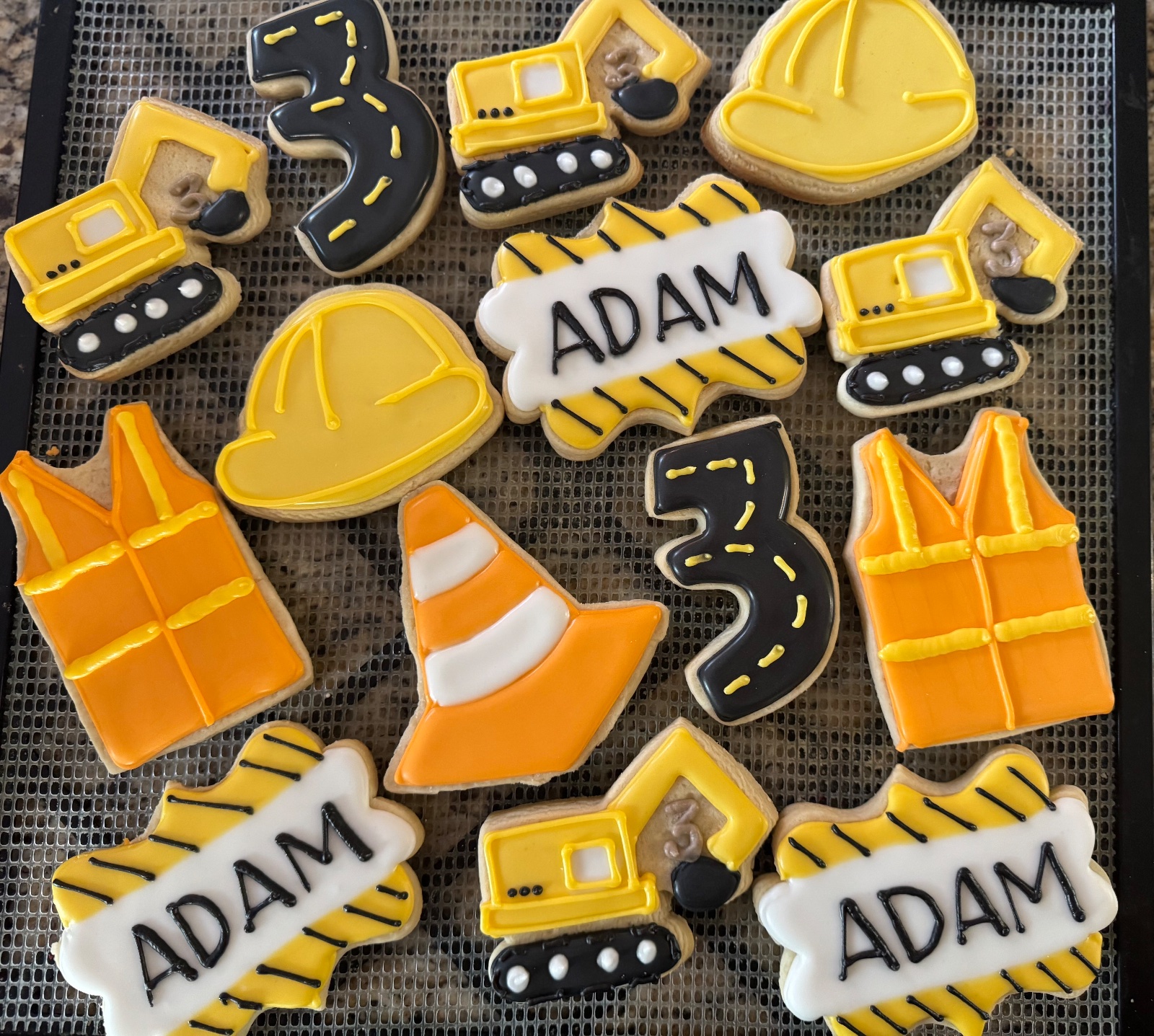 Custom decorated cookies by Kicker Konfections