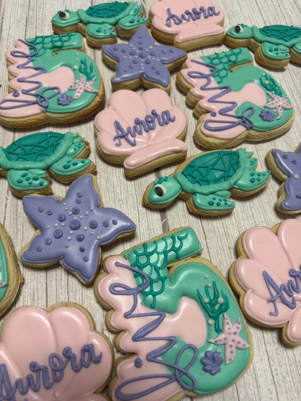 Custom decorated cookies by Kicker Konfections