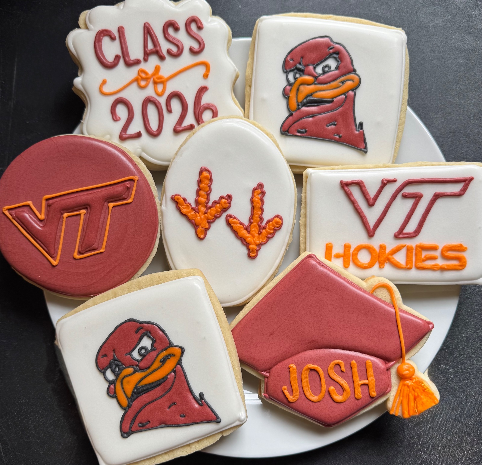Custom decorated cookies by Kicker Konfections