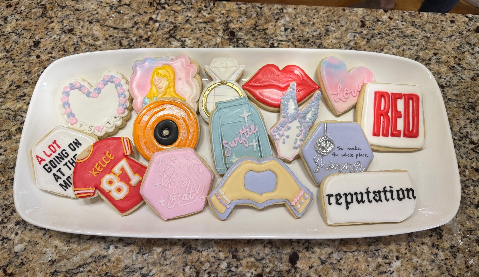 Custom decorated cookies by Kicker Konfections