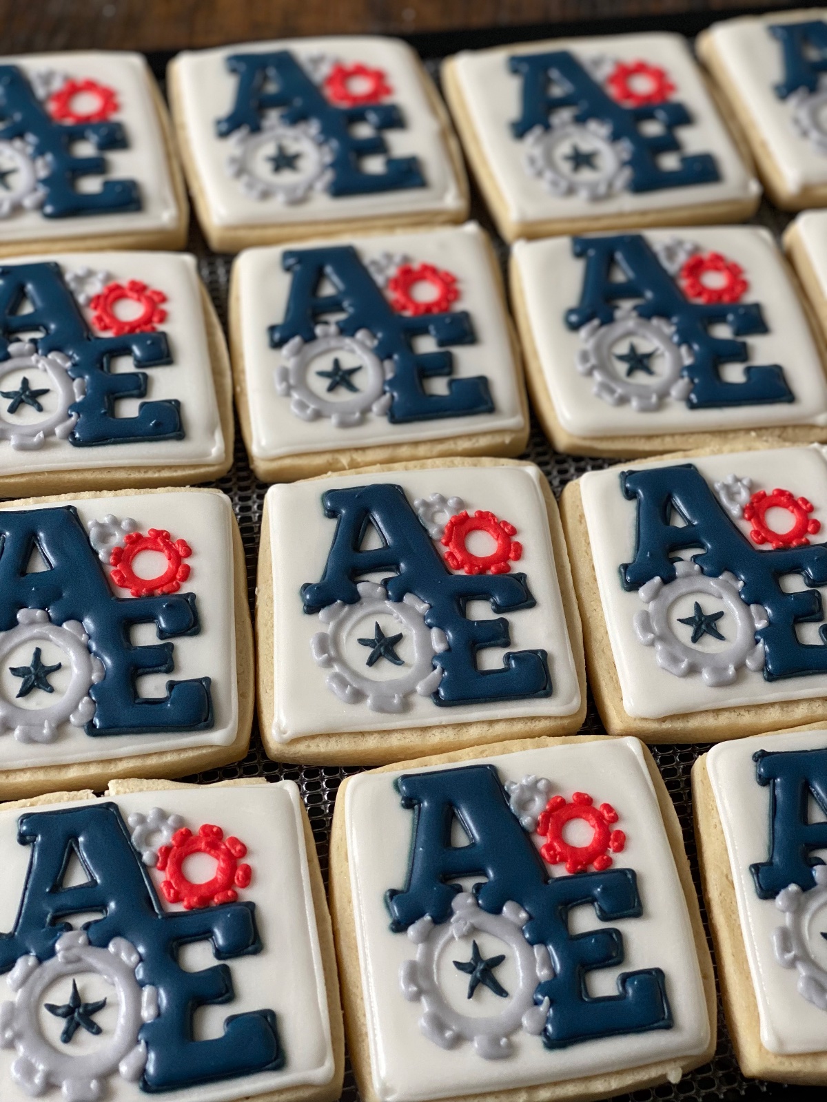 Custom decorated cookies by Kicker Konfections