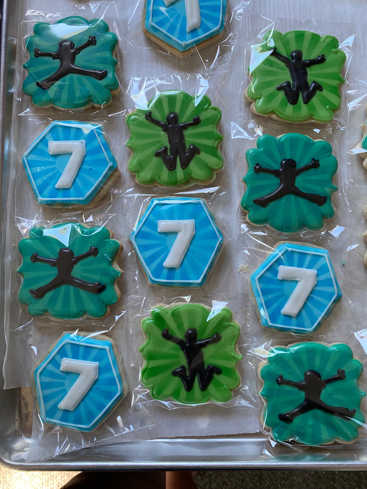 Custom decorated cookies by Kicker Konfections