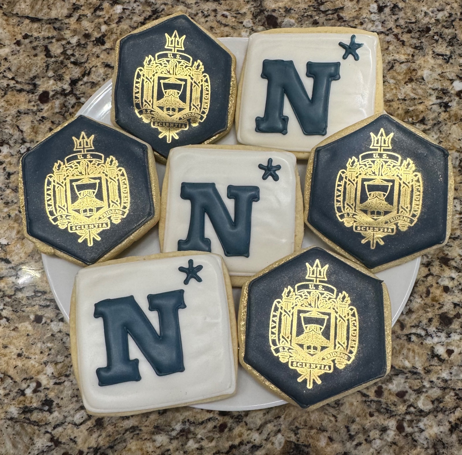 Custom decorated cookies by Kicker Konfections