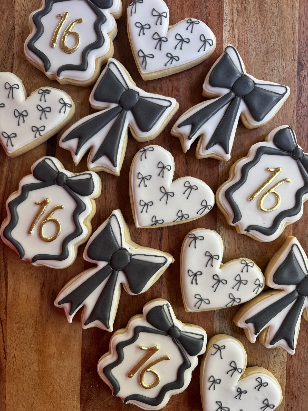 Custom decorated cookies by Kicker Konfections