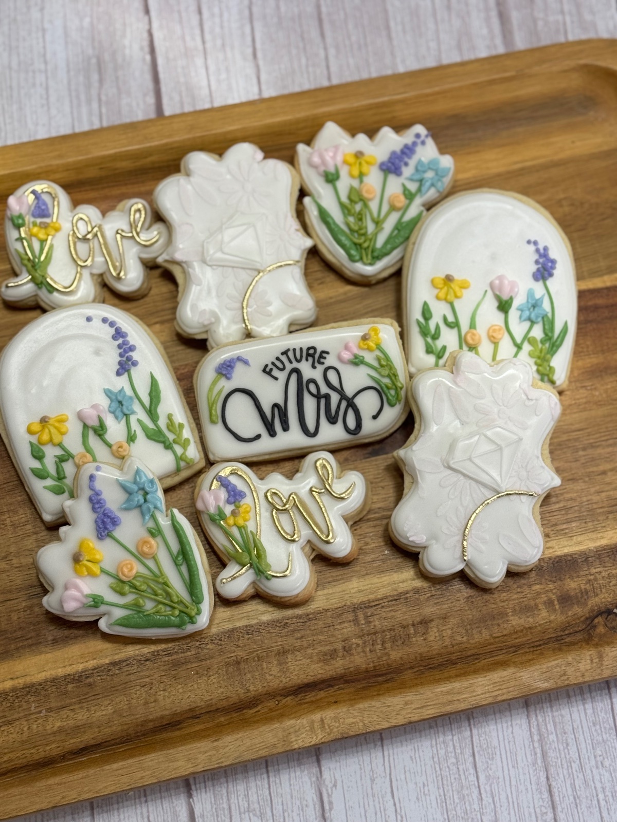 Custom decorated cookies by Kicker Konfections