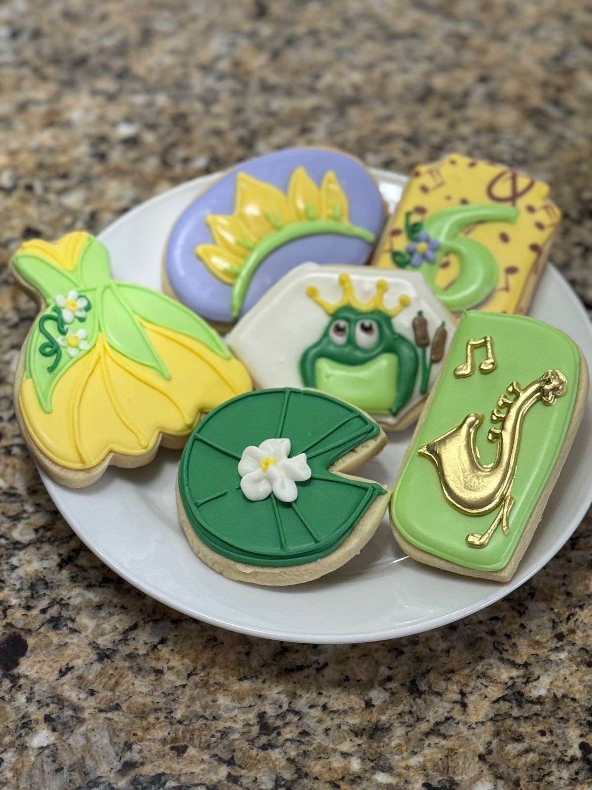 Custom decorated cookies by Kicker Konfections