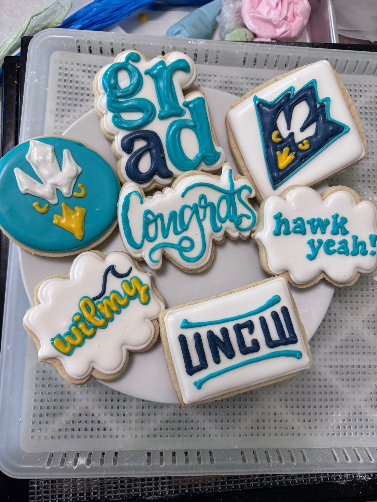 Custom decorated cookies by Kicker Konfections
