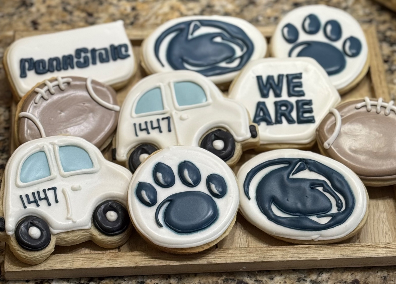 Custom decorated cookies by Kicker Konfections