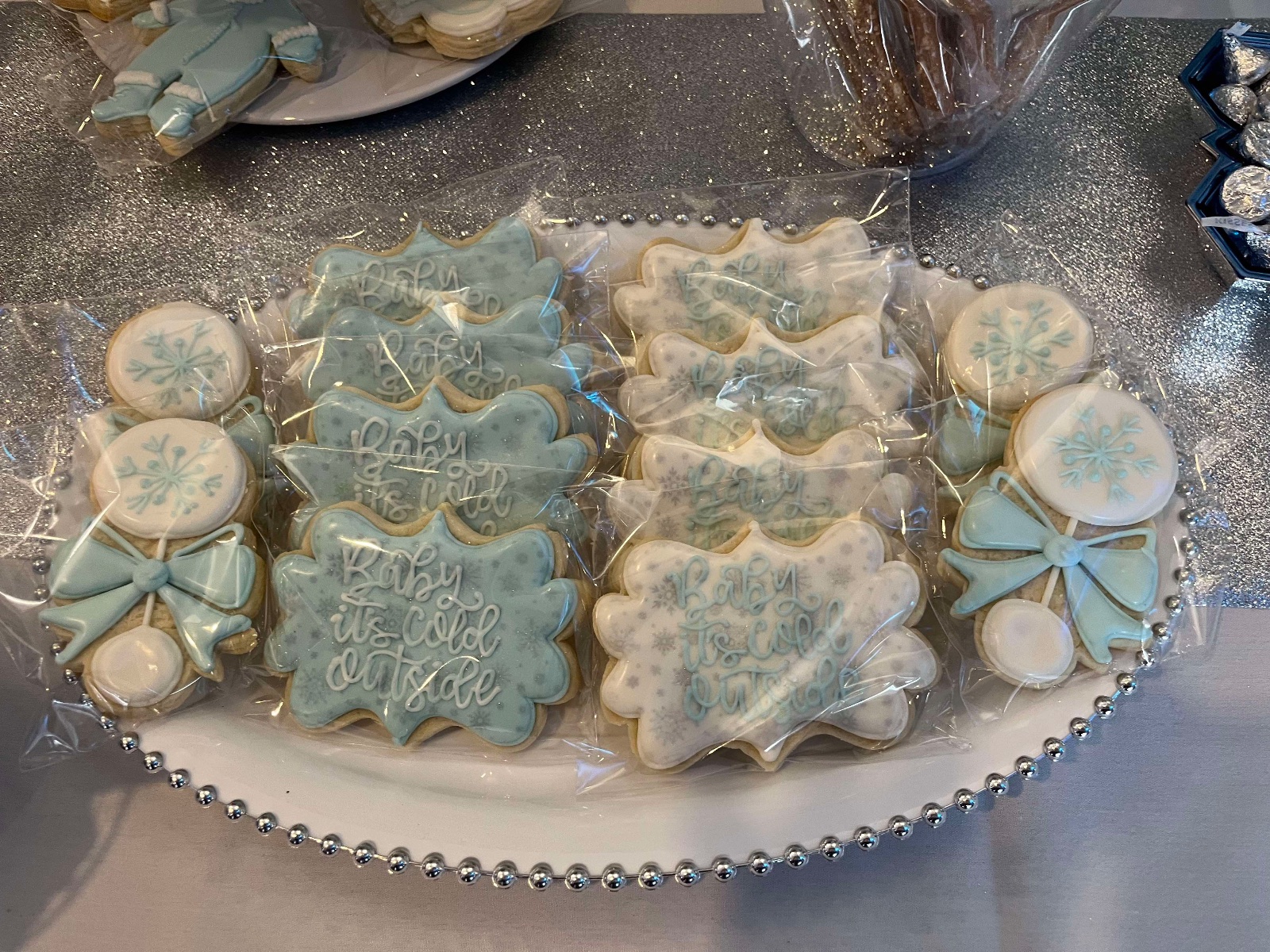 Custom decorated cookies by Kicker Konfections