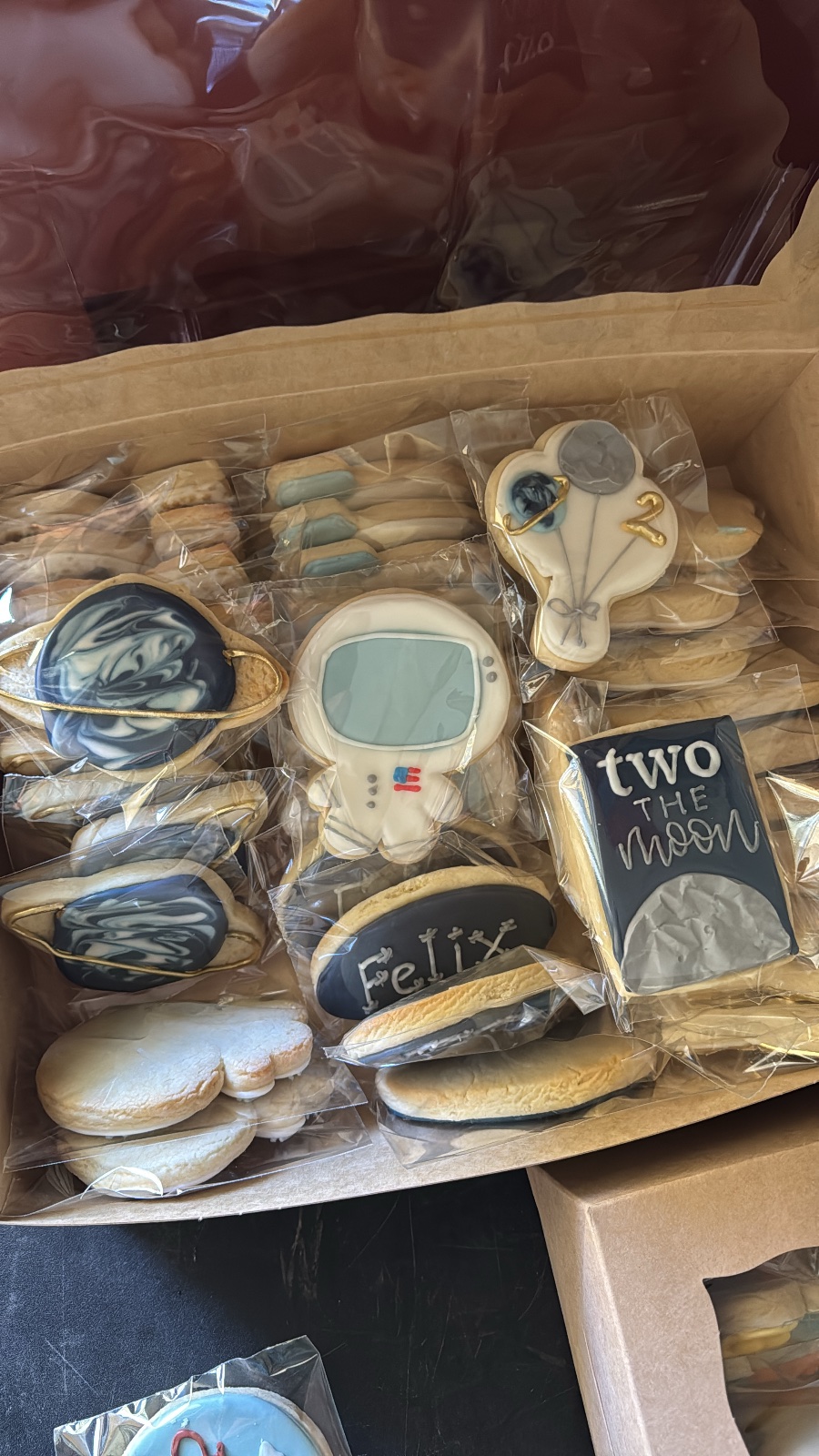 Custom decorated cookies by Kicker Konfections