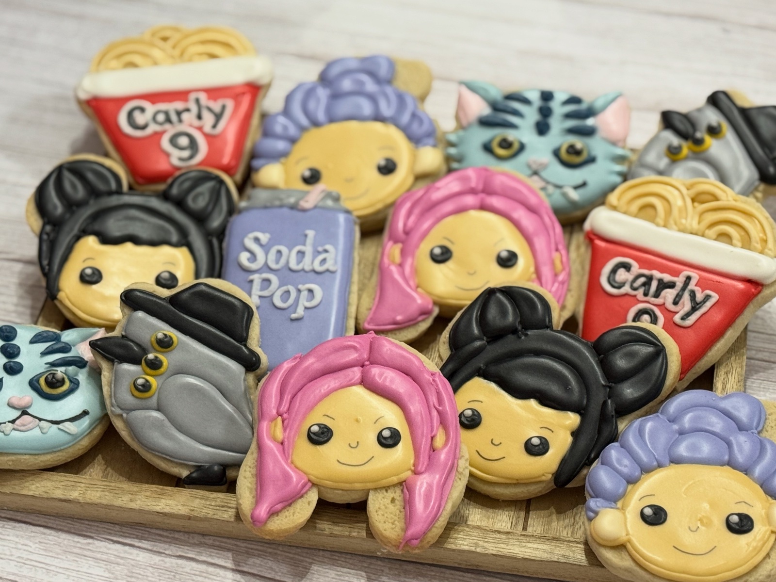 Custom decorated cookies by Kicker Konfections