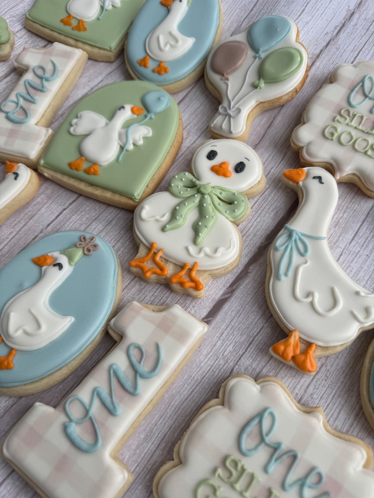 Custom decorated cookies by Kicker Konfections