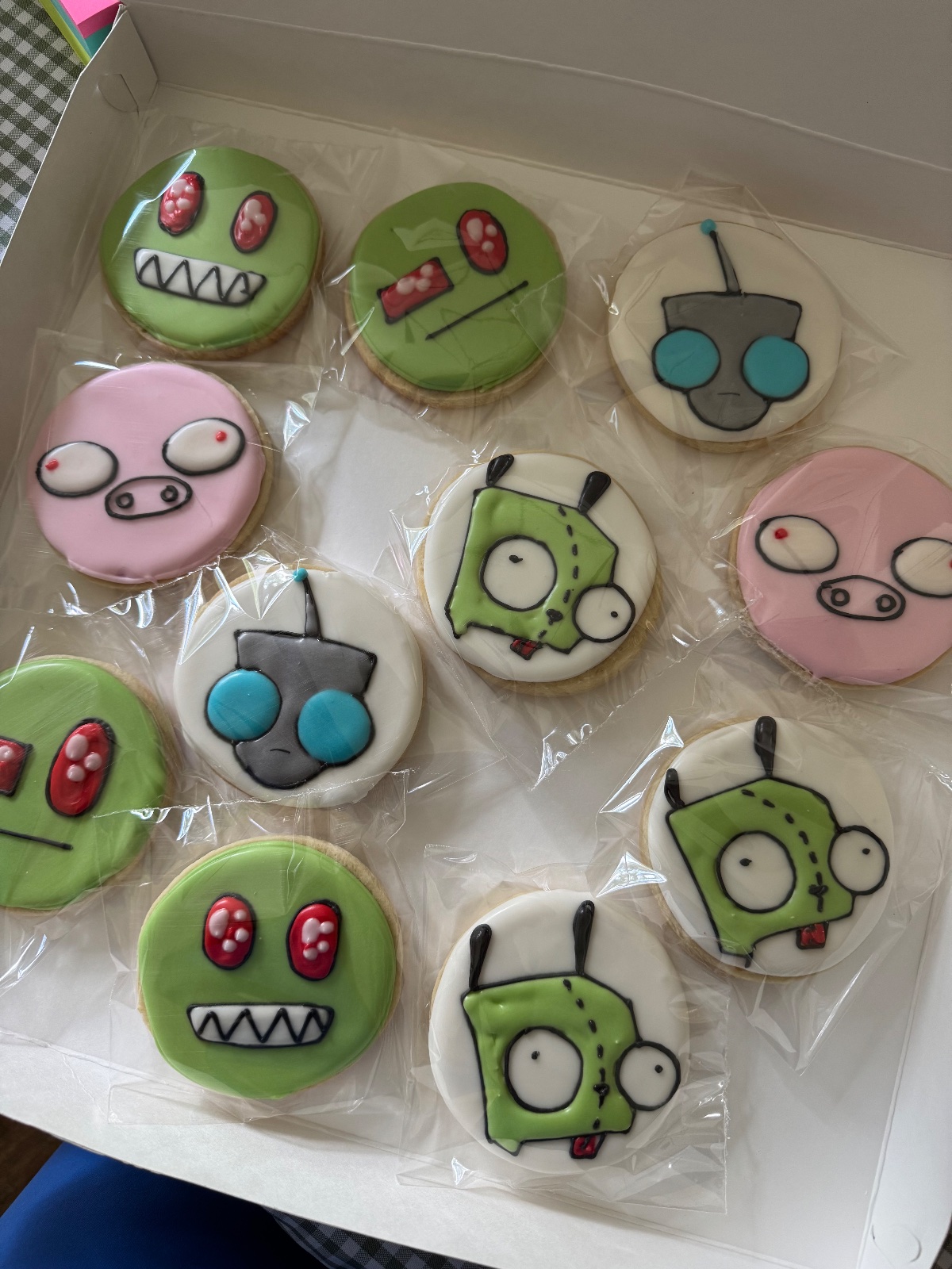 Custom decorated cookies by Kicker Konfections