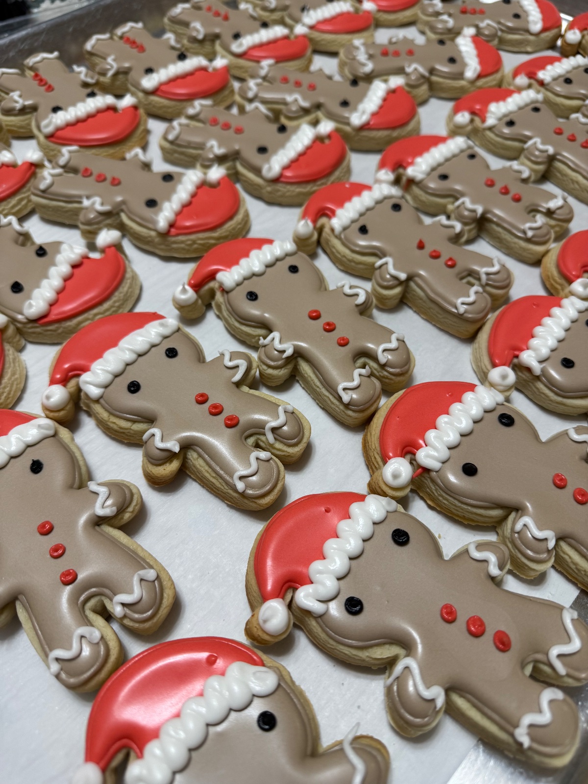 Custom decorated cookies by Kicker Konfections