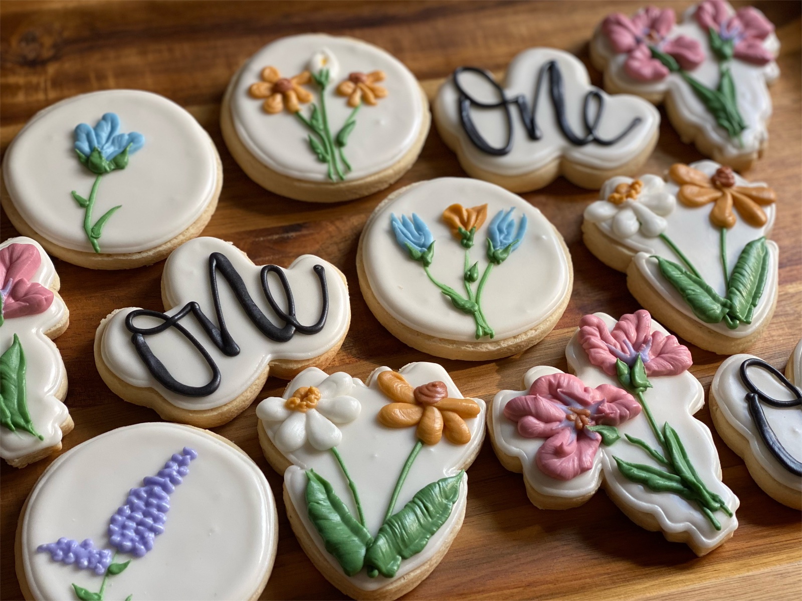 Custom decorated cookies by Kicker Konfections