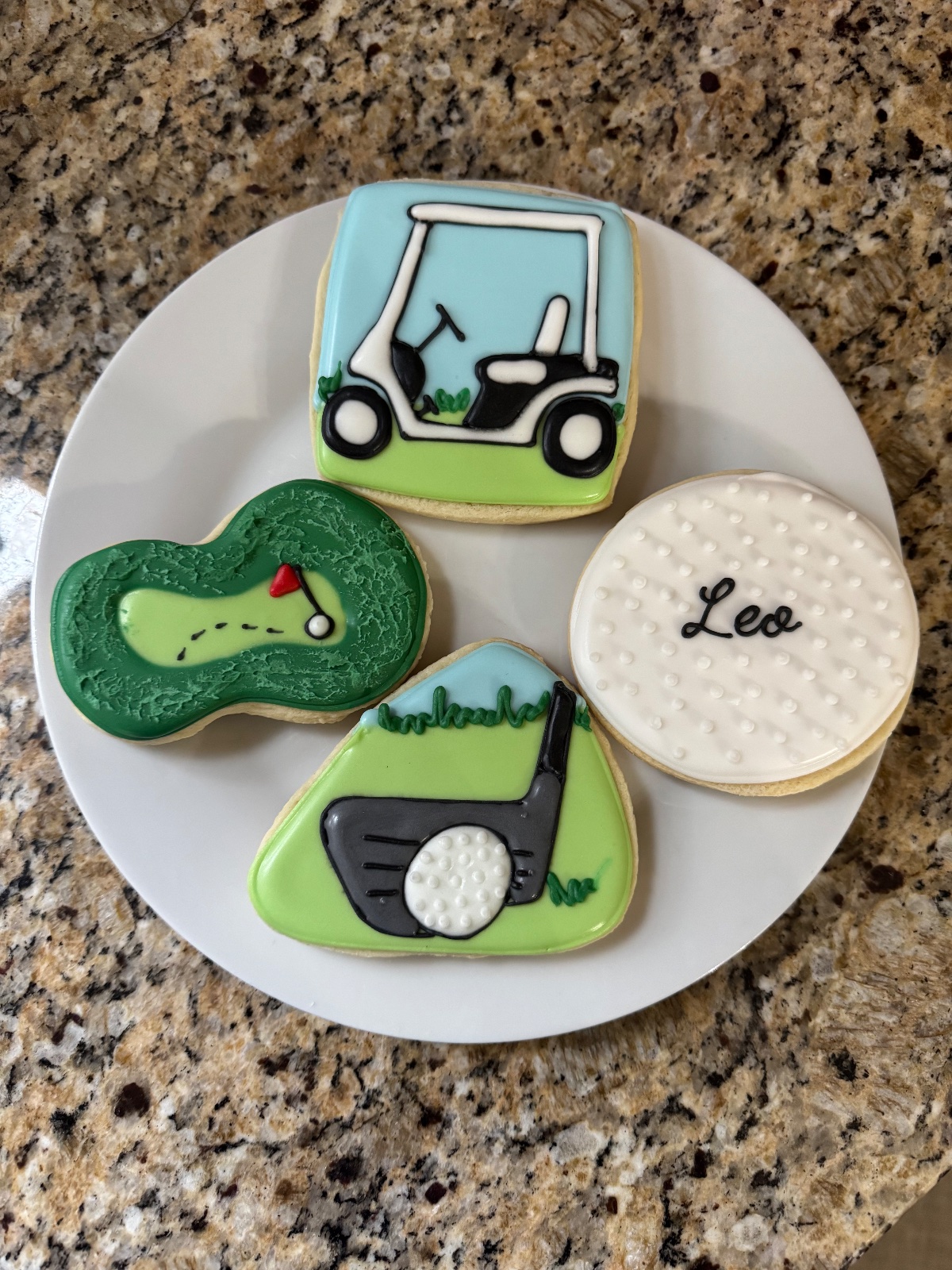 Custom decorated cookies by Kicker Konfections