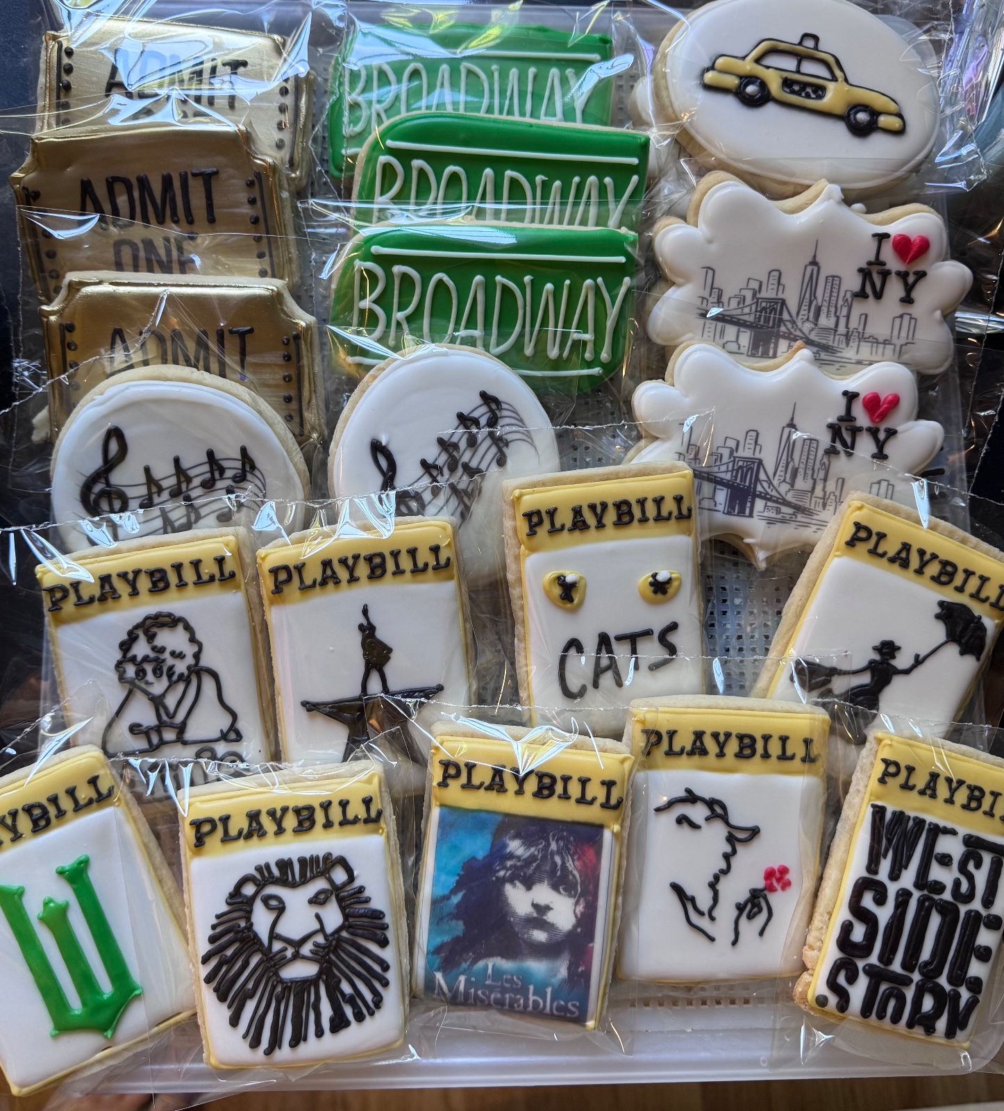 Custom decorated cookies by Kicker Konfections
