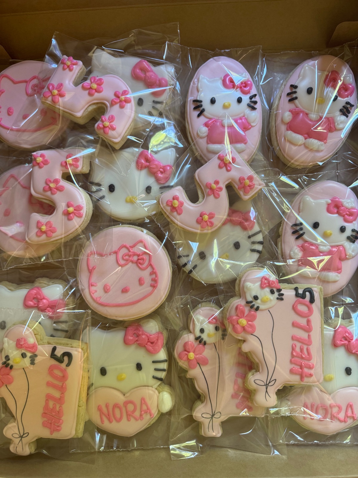 Custom decorated cookies by Kicker Konfections