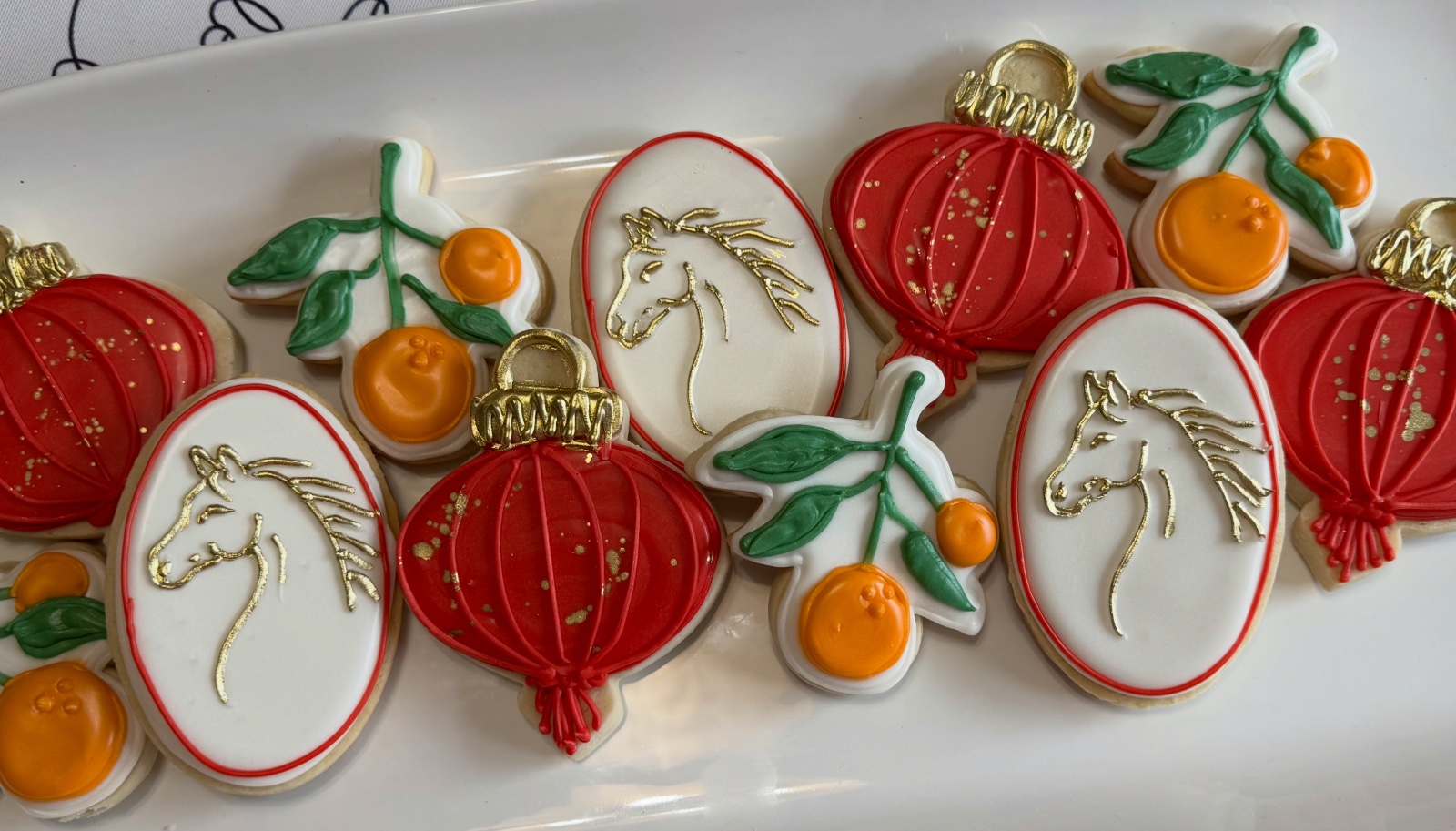 Custom decorated cookies by Kicker Konfections
