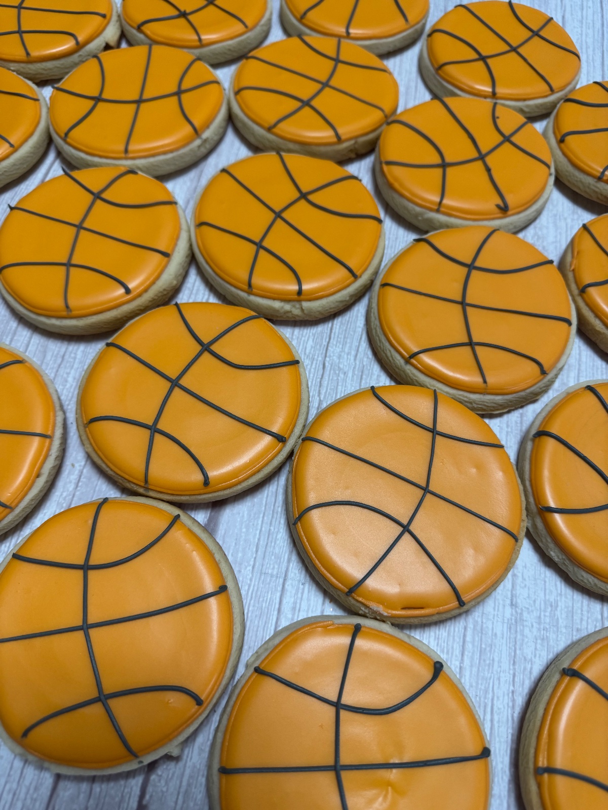 Custom decorated cookies by Kicker Konfections