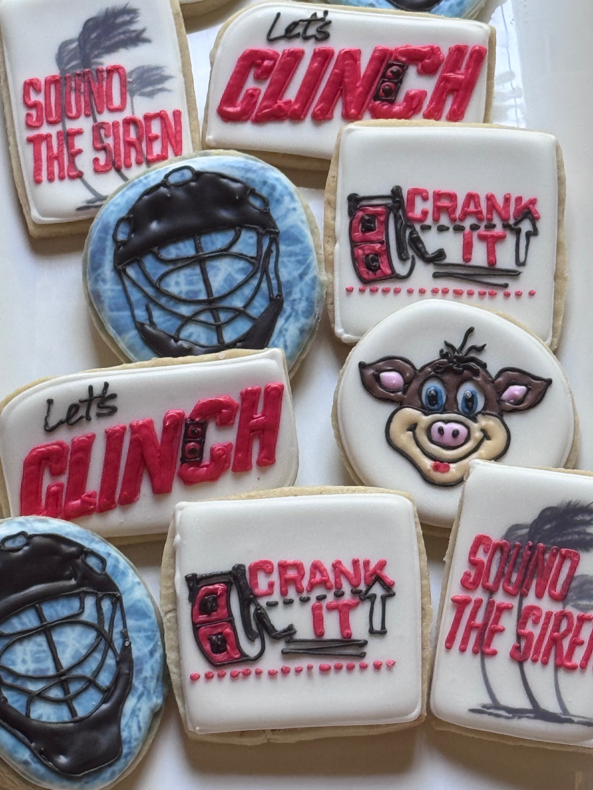 Custom decorated cookies by Kicker Konfections