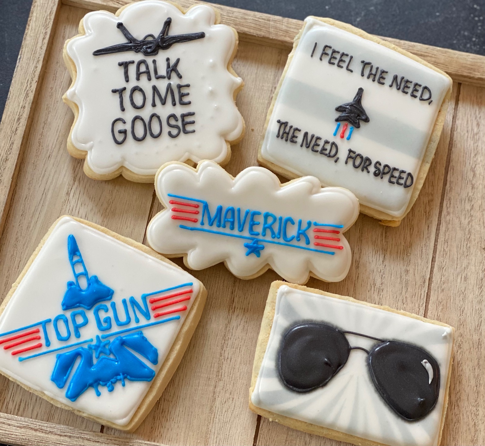 Custom decorated cookies by Kicker Konfections