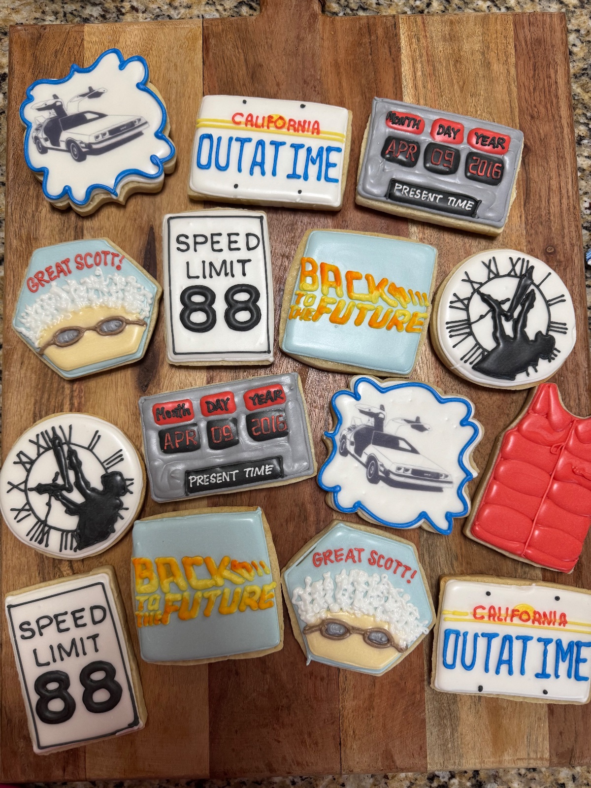 Custom decorated cookies by Kicker Konfections