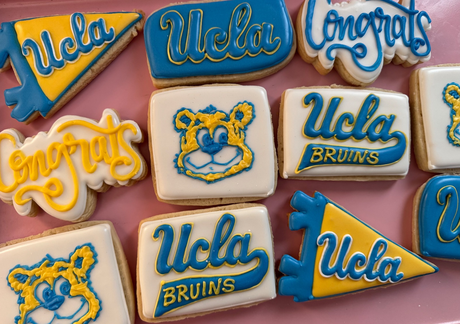Custom decorated cookies by Kicker Konfections