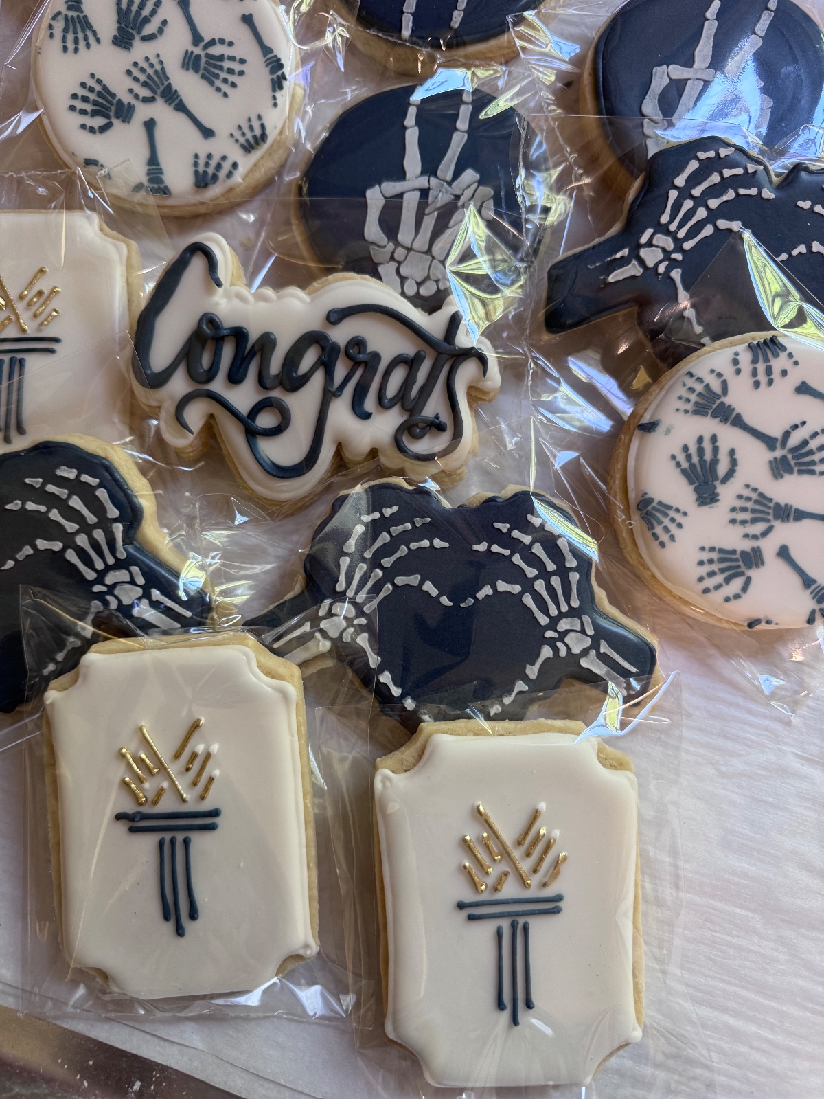 Custom decorated cookies by Kicker Konfections